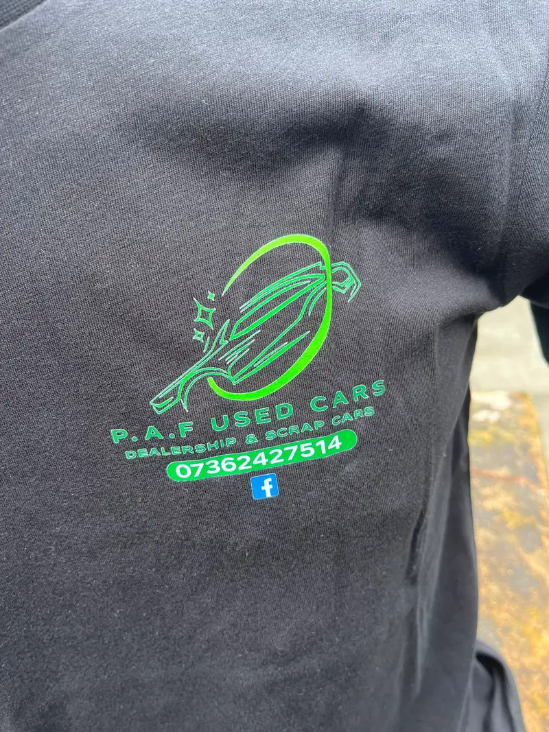 Close-up of the P.A.F Used Cars logo, cut and pressed in green vinyl at the ThreeKZ workshop in Colne