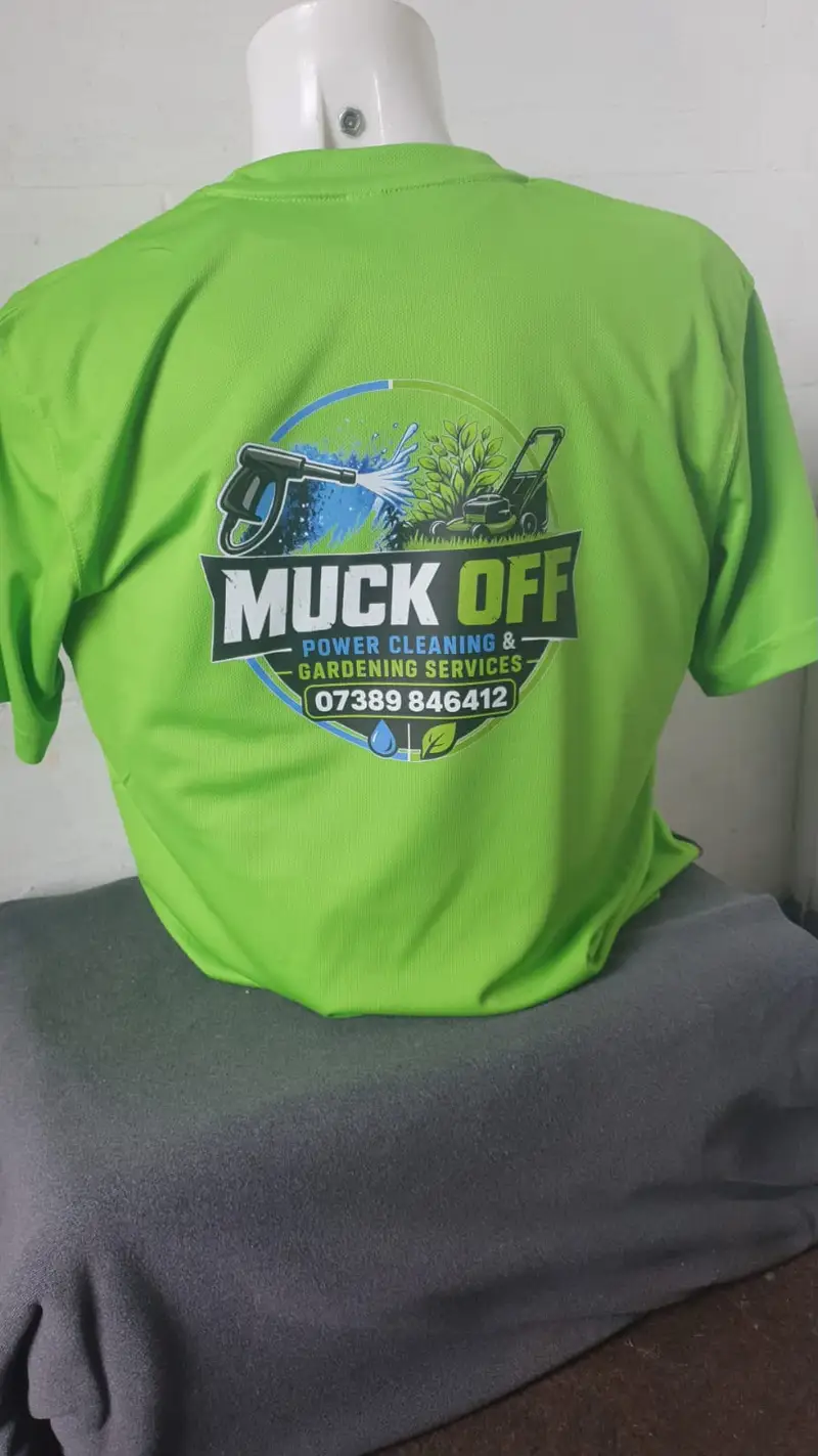Lime green work t-shirt printed on the back with the Muck Off pressure washing and gardening logo
